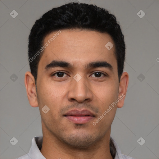 Neutral latino young-adult male with short  black hair and brown eyes