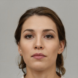 Neutral white young-adult female with medium  brown hair and brown eyes