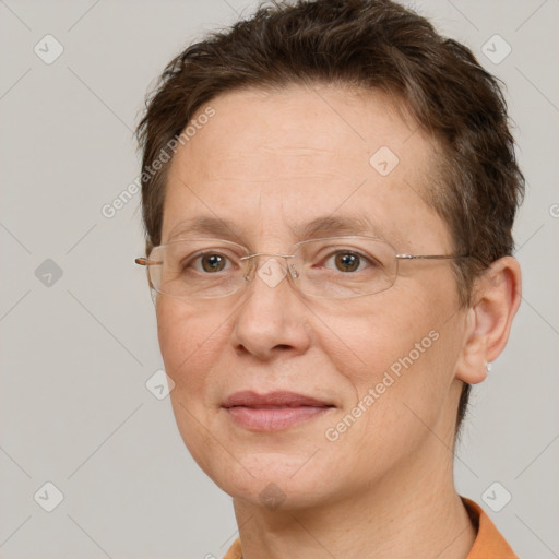 Joyful white adult female with short  brown hair and brown eyes