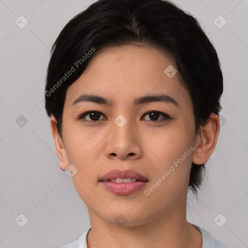 Joyful asian young-adult female with short  black hair and brown eyes