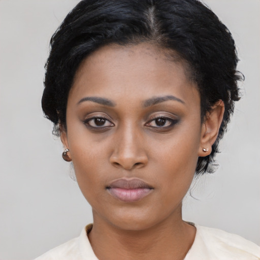 Neutral black young-adult female with short  black hair and brown eyes