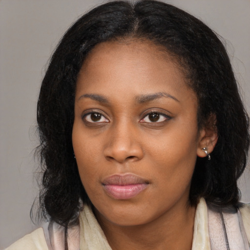 Neutral black young-adult female with medium  black hair and brown eyes