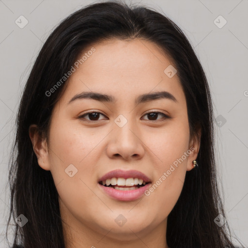 Joyful asian young-adult female with long  brown hair and brown eyes