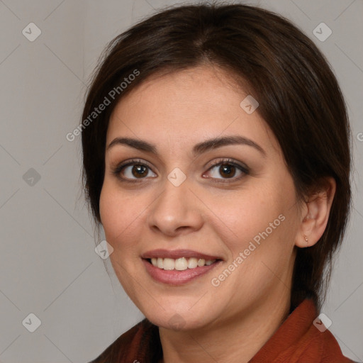 Joyful white young-adult female with medium  brown hair and brown eyes