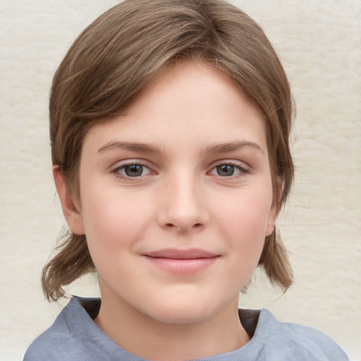 Joyful white child female with medium  brown hair and grey eyes