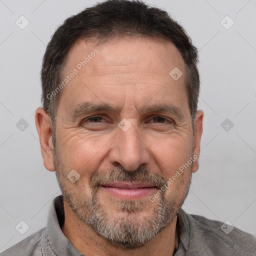 Joyful white middle-aged male with short  brown hair and brown eyes