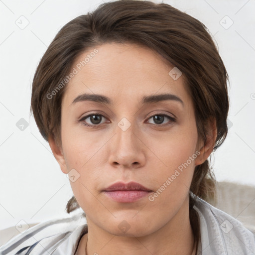 Neutral white young-adult female with short  brown hair and brown eyes