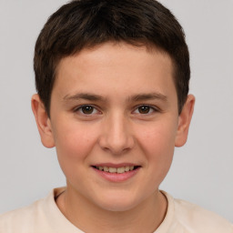 Joyful white child male with short  brown hair and brown eyes