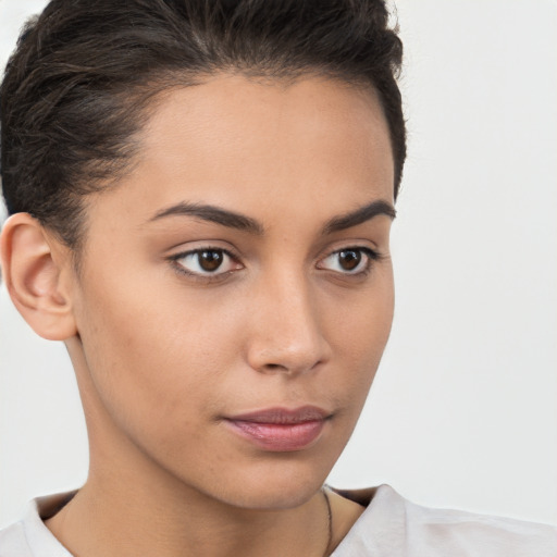 Neutral white young-adult female with short  brown hair and brown eyes