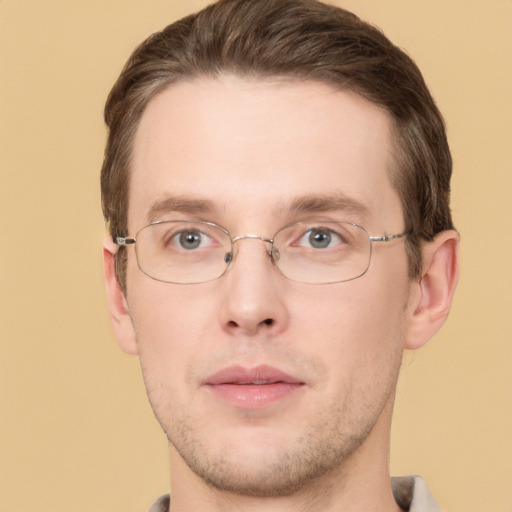 Joyful white adult male with short  brown hair and grey eyes