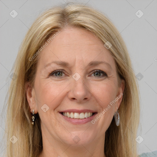 Joyful white adult female with medium  brown hair and grey eyes