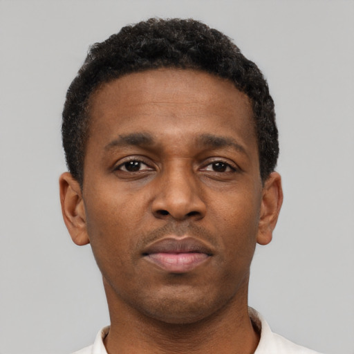 Neutral black young-adult male with short  brown hair and brown eyes