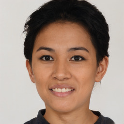 Joyful asian young-adult female with short  black hair and brown eyes