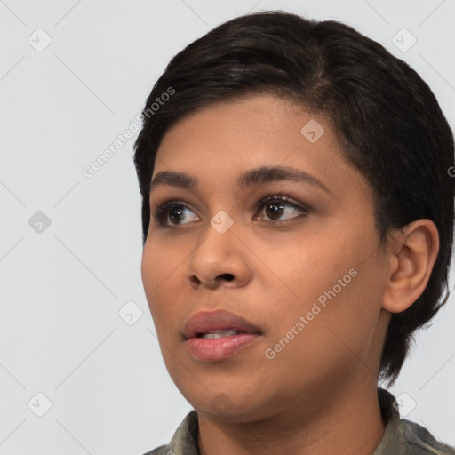 Neutral latino young-adult female with short  black hair and brown eyes