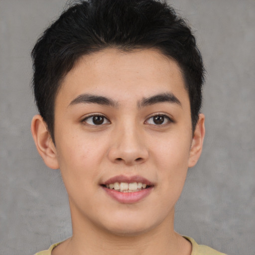Joyful asian young-adult female with short  brown hair and brown eyes