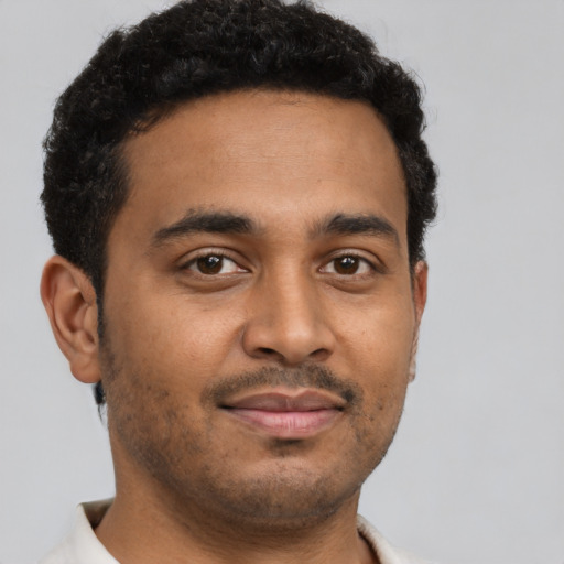 Neutral black young-adult male with short  brown hair and brown eyes
