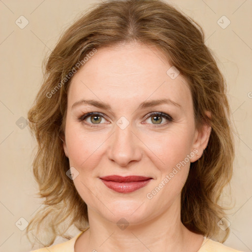 Joyful white young-adult female with medium  brown hair and green eyes