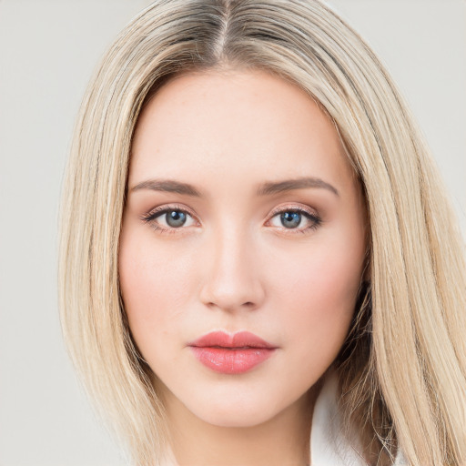 Neutral white young-adult female with long  brown hair and green eyes