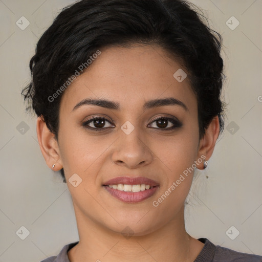 Joyful latino young-adult female with short  brown hair and brown eyes