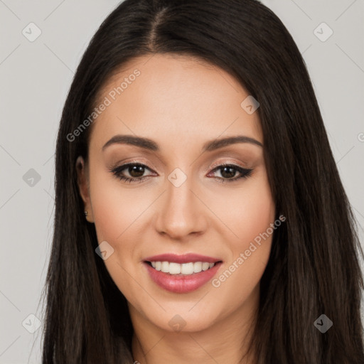 Joyful white young-adult female with long  black hair and brown eyes