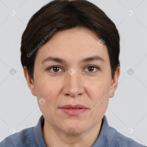 Joyful white adult female with short  brown hair and brown eyes