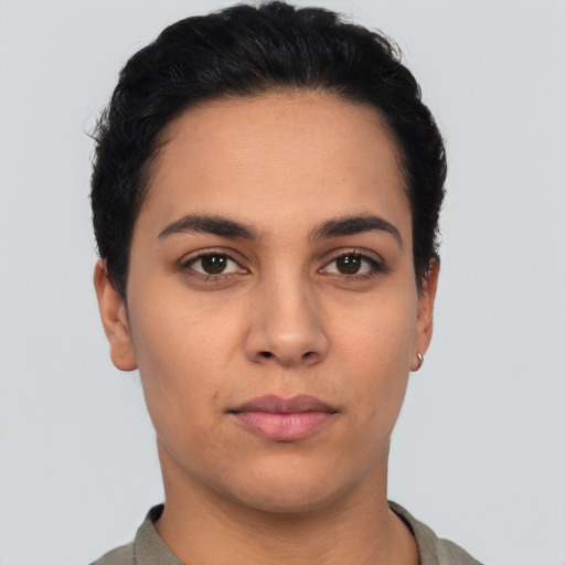 Neutral latino young-adult female with short  black hair and brown eyes