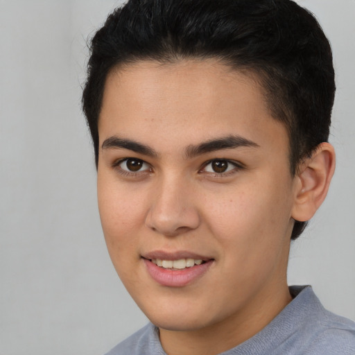 Joyful latino young-adult female with short  brown hair and brown eyes