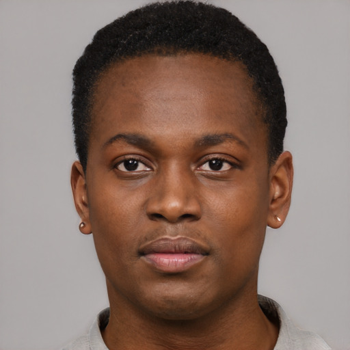Neutral black young-adult male with short  black hair and brown eyes