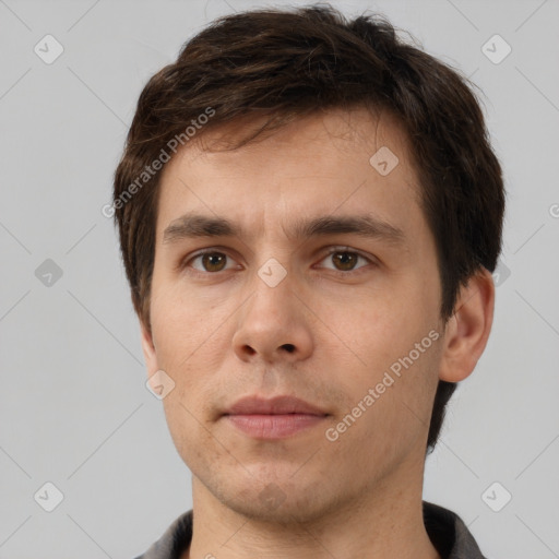 Neutral white young-adult male with short  brown hair and brown eyes