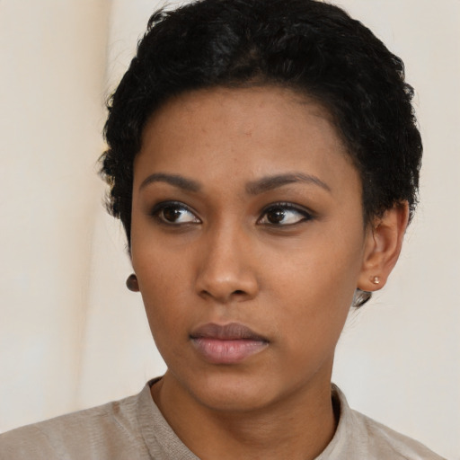 Neutral latino young-adult female with short  black hair and brown eyes