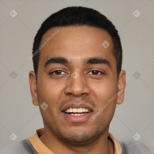 Joyful latino young-adult male with short  black hair and brown eyes