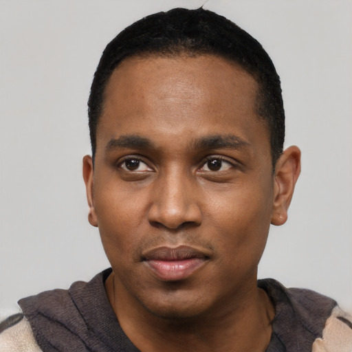 Neutral black young-adult male with short  black hair and brown eyes