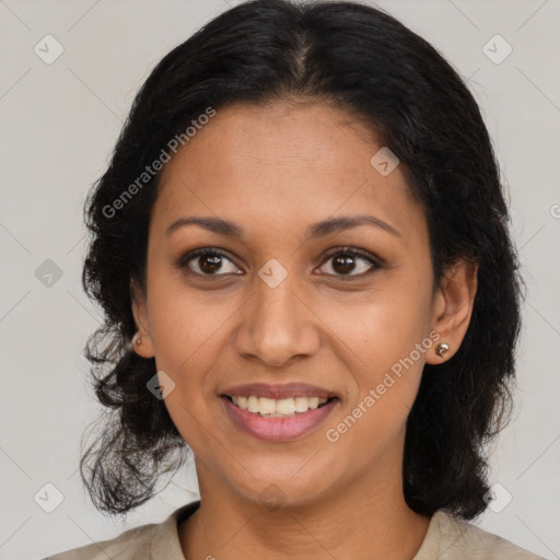 Joyful latino young-adult female with medium  brown hair and brown eyes