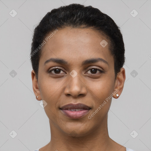 Joyful latino young-adult female with short  black hair and brown eyes