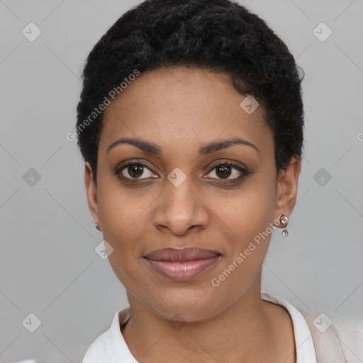 Joyful black young-adult female with short  black hair and brown eyes