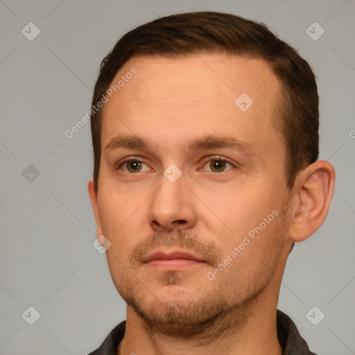 Neutral white young-adult male with short  brown hair and grey eyes