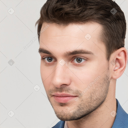 Neutral white young-adult male with short  brown hair and brown eyes