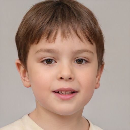 Joyful white child male with short  brown hair and brown eyes