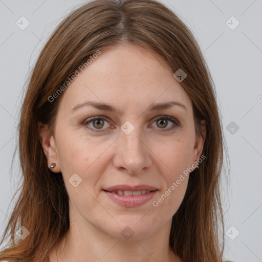 Joyful white adult female with long  brown hair and grey eyes