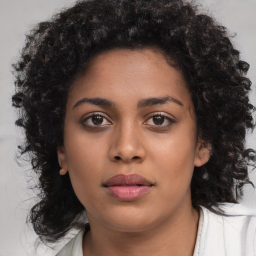 Neutral latino young-adult female with medium  black hair and brown eyes