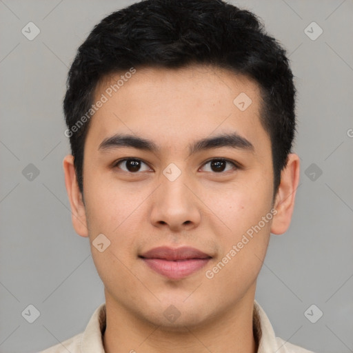 Joyful latino young-adult male with short  black hair and brown eyes