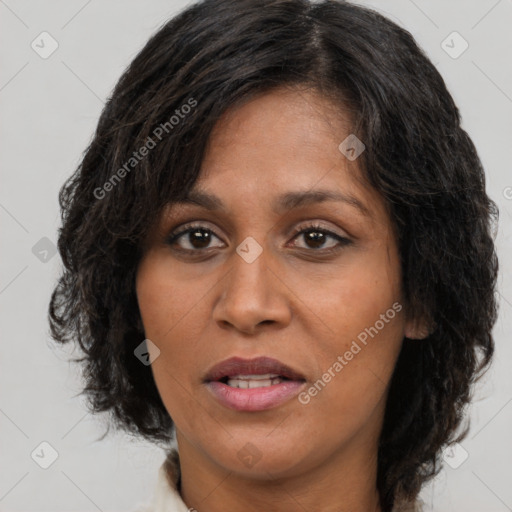 Joyful white adult female with long  brown hair and brown eyes