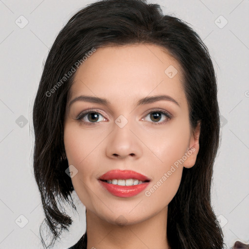 Joyful white young-adult female with long  black hair and brown eyes