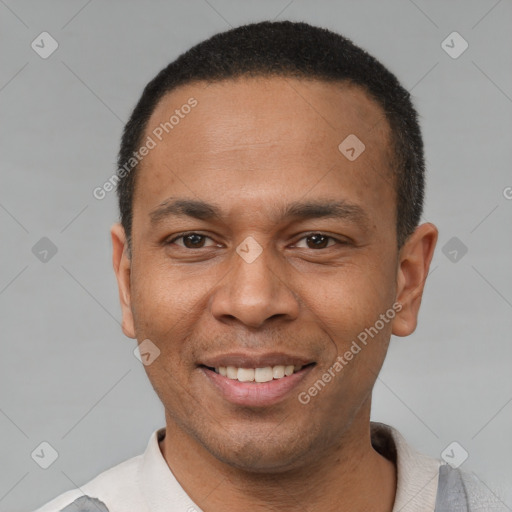 Joyful latino adult male with short  black hair and brown eyes