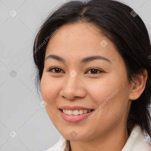 Joyful white young-adult female with medium  brown hair and brown eyes