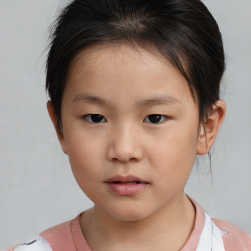 Neutral white child female with medium  brown hair and brown eyes