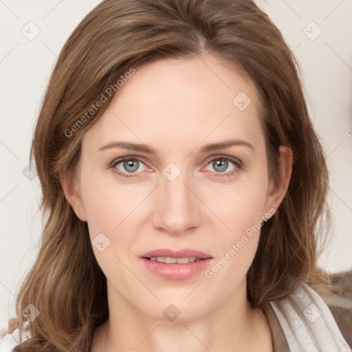 Joyful white young-adult female with long  brown hair and blue eyes