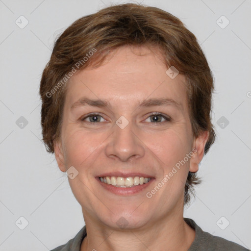 Joyful white adult female with short  brown hair and grey eyes