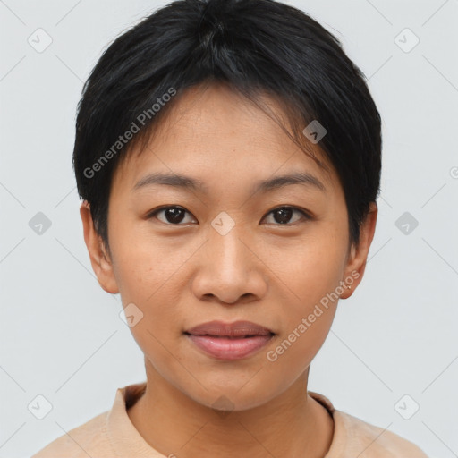 Joyful asian young-adult female with short  brown hair and brown eyes