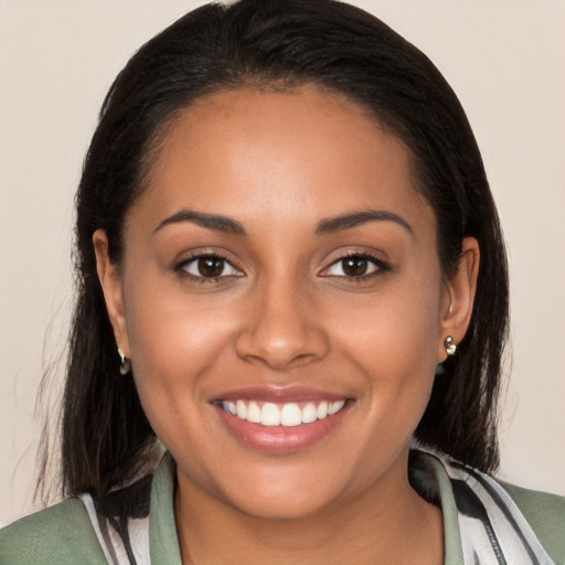 Joyful white young-adult female with medium  brown hair and brown eyes